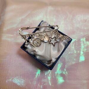 Silver Toned Charmed Brooch